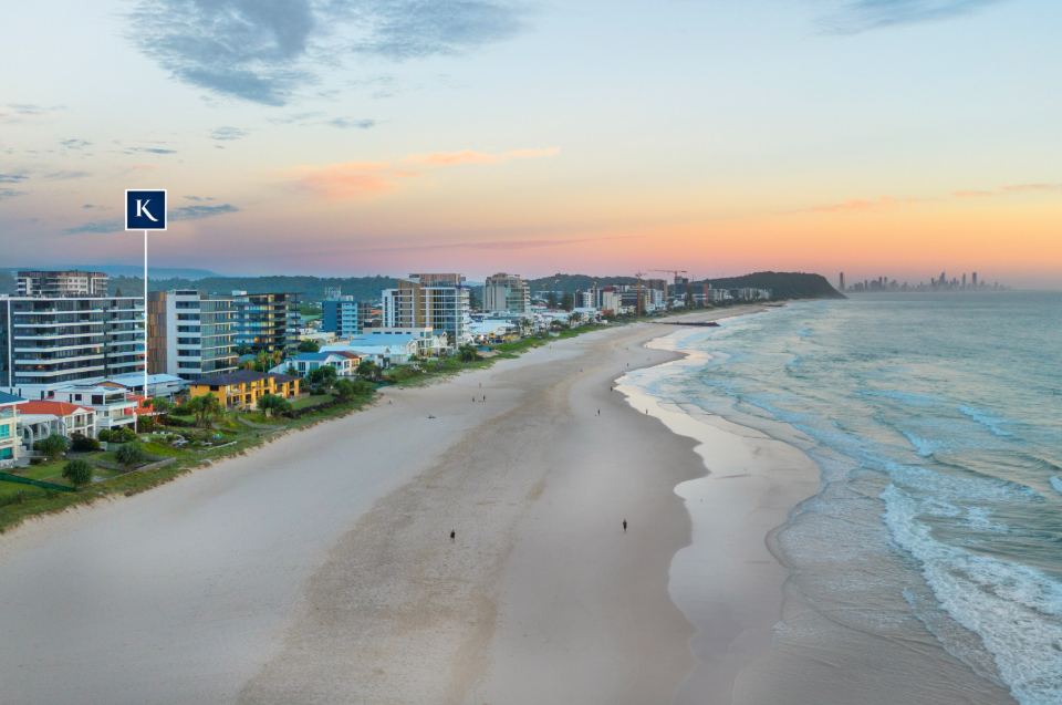 Aerial view north along Palm Beach towards the Gold Coast skyline at sunrise