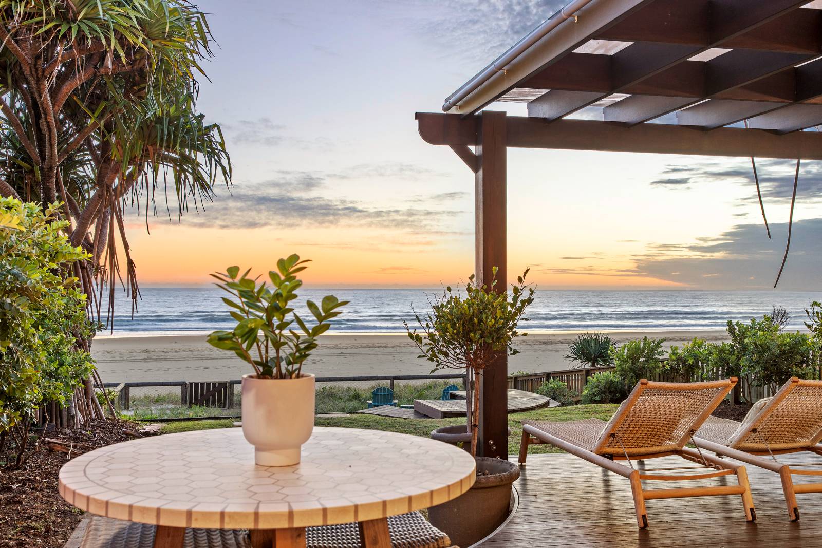 Sunrise over the ocean from the pergola terrace at The Beach House by Sandbox, Palm Beach